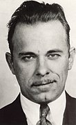 https://upload.wikimedia.org/wikipedia/commons/thumb/a/ab/John_Dillinger_mug_shot.jpg/110px-John_Dillinger_mug_shot.jpg